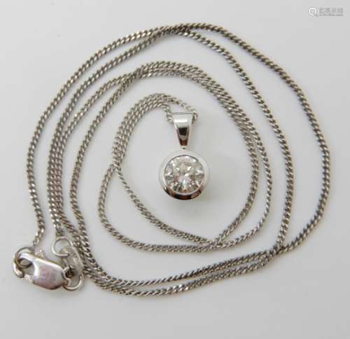 AN 18CT WHITE GOLD DIAMOND SOLITAIRE PENDANT of estimated approx 0.50cts in classic rub over