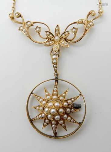 A 15CT GOLD EDWARDIAN PEARL PENDANT NECKLACE with pearl set floral motifs and star pendant brooch,