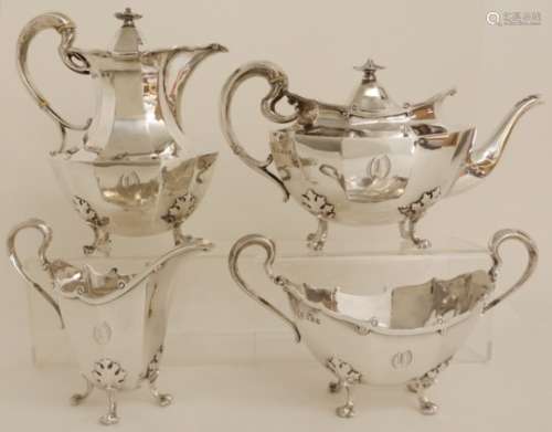 A FOUR PIECE SILVER TEA SERVICE by James Ballantyne & Son, Glasgow 1916, of faceted oval form with