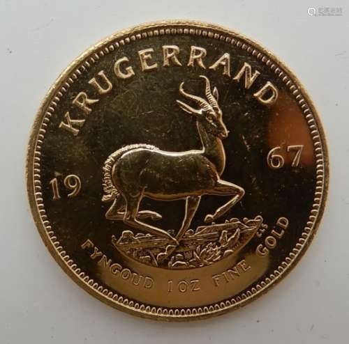 A CASED SOUTH AFRICAN KRUGERRAND 1967 with certificate Condition Report: Available upon request