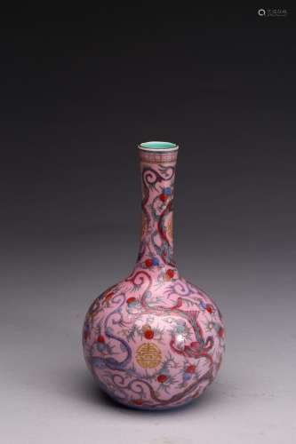 A FAMILLE ROSE PINK GROUND 'DRAGON' BOTTLE VASE