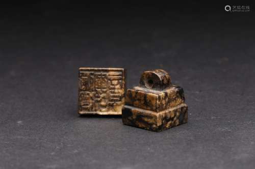 A PAIR OF TWO SMALL ARCHAIC BLACK JADE SEALS