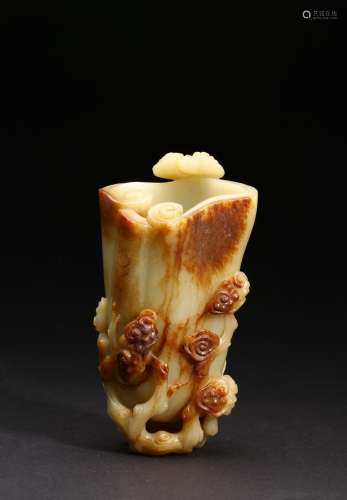A YELLOW JADE CARVED 'LINGZHI' FLOWER VASE
