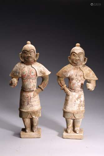 A PAIR OF PAINTED POTTERY FIGURES OF STANDING WARRIORS