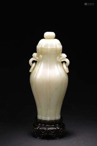 A WHITE JADE LOBED VASE AND COVER WITH ZITAN STAND