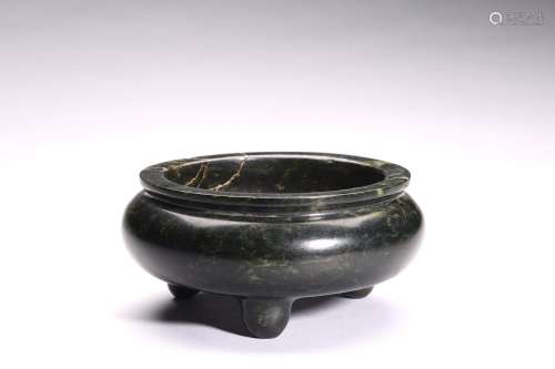 A SPINACH GREEN JADE CARVED TRIPOD CENSER