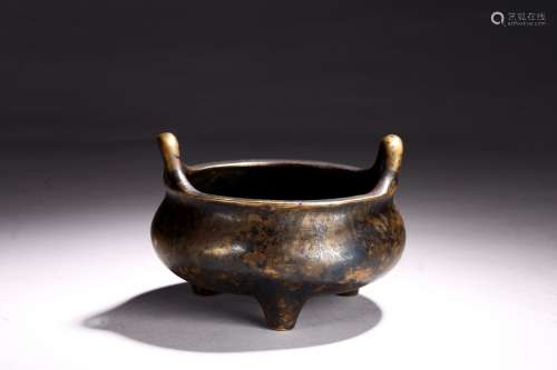 A BRONZE TRIPOD CENSER