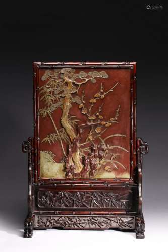 A FINE QIYANG STONE CARVED 'FLOWERS' TABLE SCREEN
