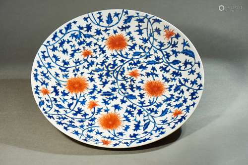 A BLUE AND WHITE UNDERGLAZE RED 'LOTUS' DISH