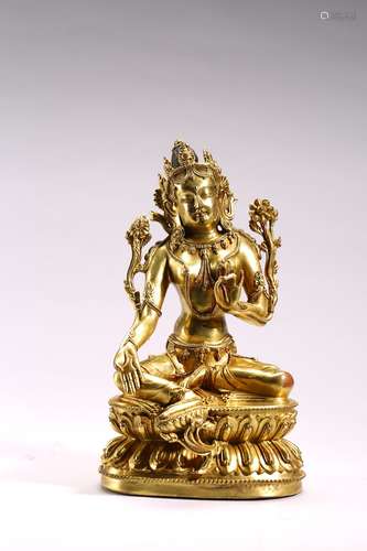 A GILT BRONZE FIGURE OF SEATED TARA