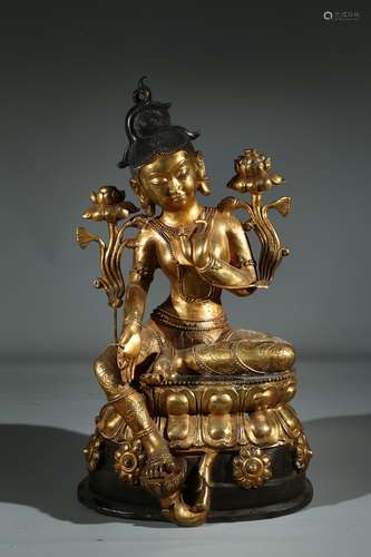 A GILT BRONZE FIGURE OF GREEN TARA