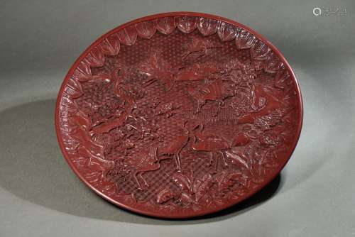 A RED LACQUERED 'CRANES' DISH