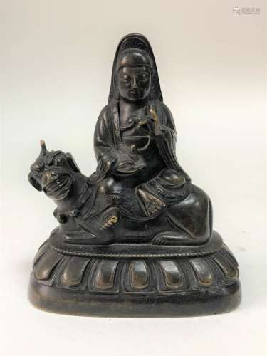 A Buddhist Deity on Lion