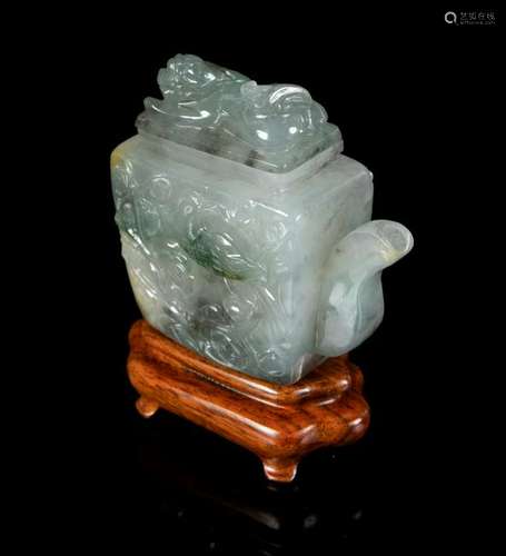 A Chinese Green and White Jadeite Teapot Height 3 in.,