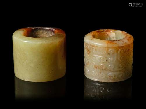 Two Chinese Jade Archer's Rings Larger: diam 1 1/4 in.,