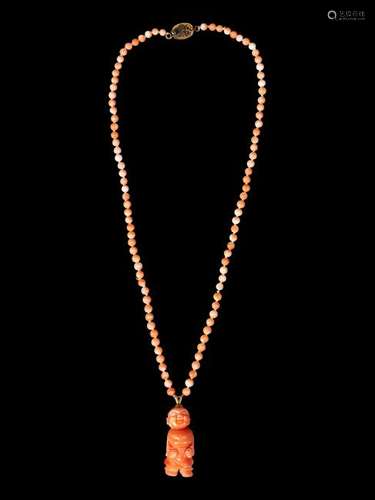 A Chinese Pink Coral Necklace Length 10 1/2 ., 27 cm.