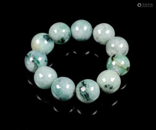 A Chinese Jadeite Beaded Bracelet Diameter 3 in., 8 cm.