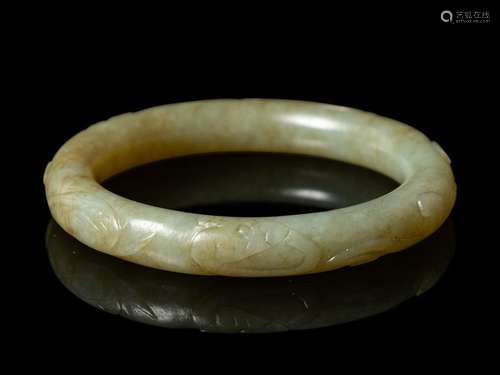 A Chinese Celadon Jade Bangle Interior: diam 2 3/8 in.,