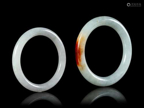 Two Chinese Jadeite Bangles Larger interior: diam 2 1/2