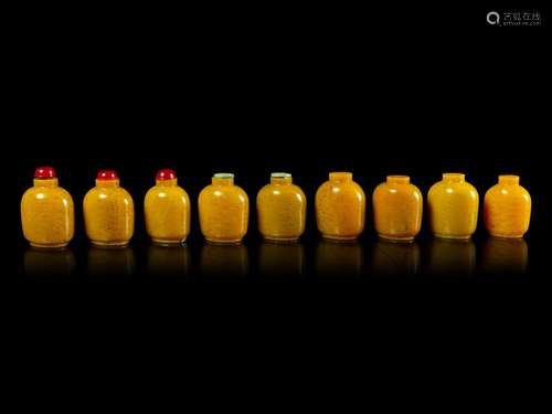 Nine Chinese Yellow Glass Snuff Bottles Each: height 2