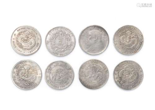 Eight Chinese Silver Coins Each: diam 1 3/4 in., 4 cm.