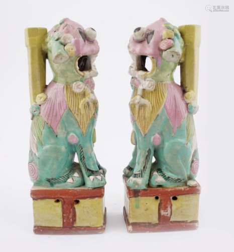 PAIR OF CHINESE QING POLYCHROME FOO DOGS