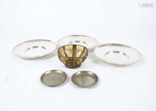 Three Elkington silver plated dishes, together with a Middle Eastern bowl, the glass encased in
