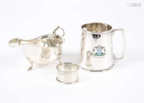 A Elizabeth II silver cream jug, hallmarked Birmingham c.1960, potentially by F H Adams and