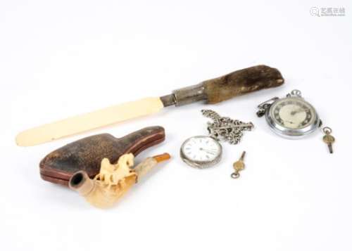 A 19th Century ivory and silver page turner, London 1896, with an animal foot handle, length 28