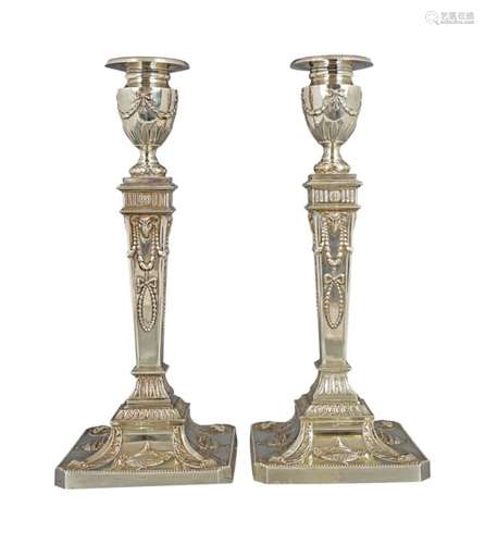 PAIR OF NEO-CLASSICAL SILVER CANDLESTICKS