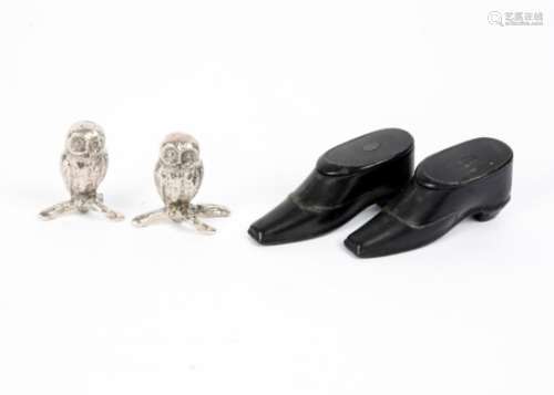 A pair of 19th Century treen snuff box shoes, together with two silver plated metal owls, length