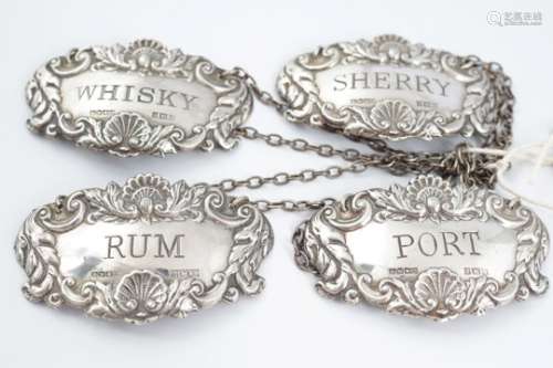 FOUR STERLING SILVER DECANTER LABELS