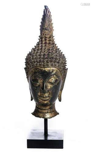 Tête de bouddha en bronze partiellement doré