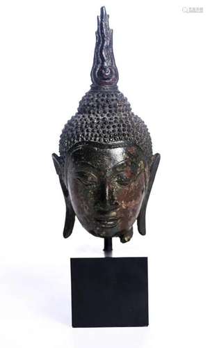 Tête de bouddha en bronze à patine rouge de