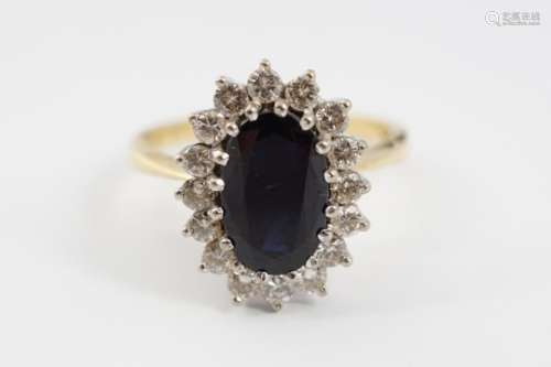 18CT GOLD SAPPHIRE AND DIAMOND RING