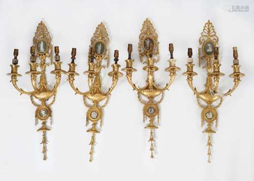 SET OF FOUR GILT BRONZE WALL APPLIQUES