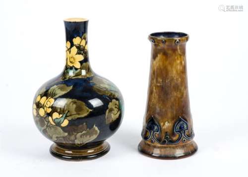 A Doulton Lambeth faience ware vase of bulbous form decorated with yellow flowers, bearing the