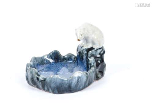 A Royal Doulton stoneware soap dish or bibelot, its subject a polar bear by the waters edge, the