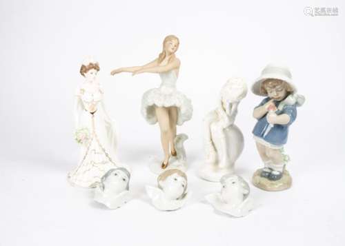 A small quantity of Lladro and Nao figures, including three boxes of putti heads, a Wallendorf