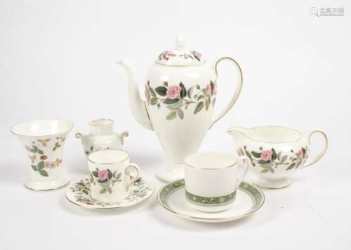 A Royal Worcester part coffee set in the Hathaway Rose pattern, together with another part set of