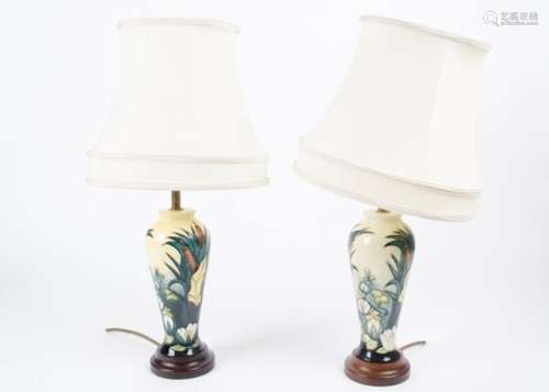 A pair of contemporary Moorcroft ceramic lamp bases, of shouldered form decorated in the Lamia