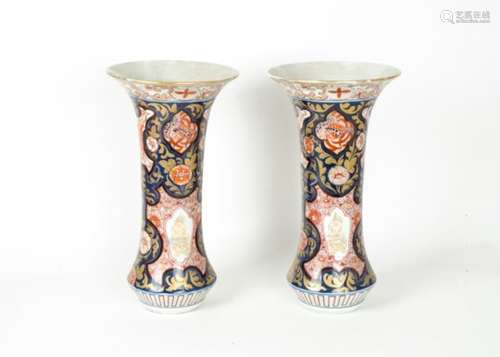 19th Century Large Imari Vases, a pair of flared vases each decorated with flowers, birds and Shisha