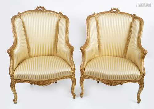 PAIR OF CARVED GILTWOOD WINGBACK ARMCHAIRS