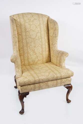 MAHOGANY AND UPHOLSTERED WING BACK ARMCHAIR