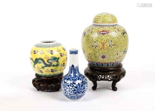 Two Chinese Qing dynasty ginger jars, with polychrome decoration of flowers and dragons upon a