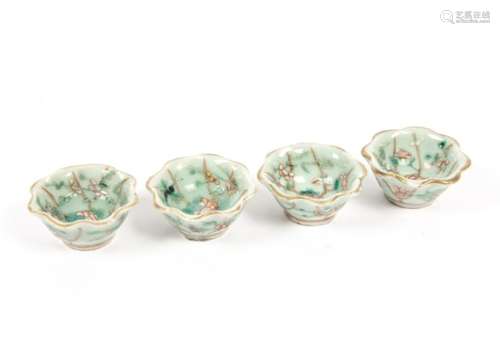 A group of Chinese celadon ground multi-lobed bowls, of miniature proportions, decorated with