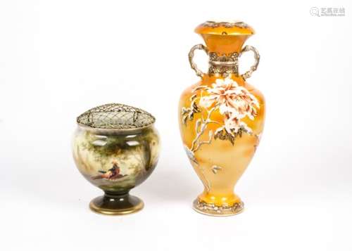 A Japanese satsuma twin handled vase, with an orange crackle glaze and decorated in white and gilt