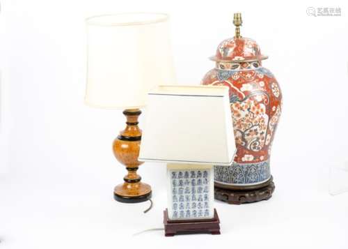 A pair of contemporary Chinese lamps, with white rectangular ceramic bodies painted with blue