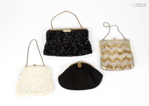 Four 20th Century evening bags, with beaded and sequinned decoration, silk interiors and metal