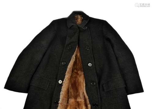 Two gentleman's coats, consisting of a 1930s double breasted overcoat, black fabric with a fur